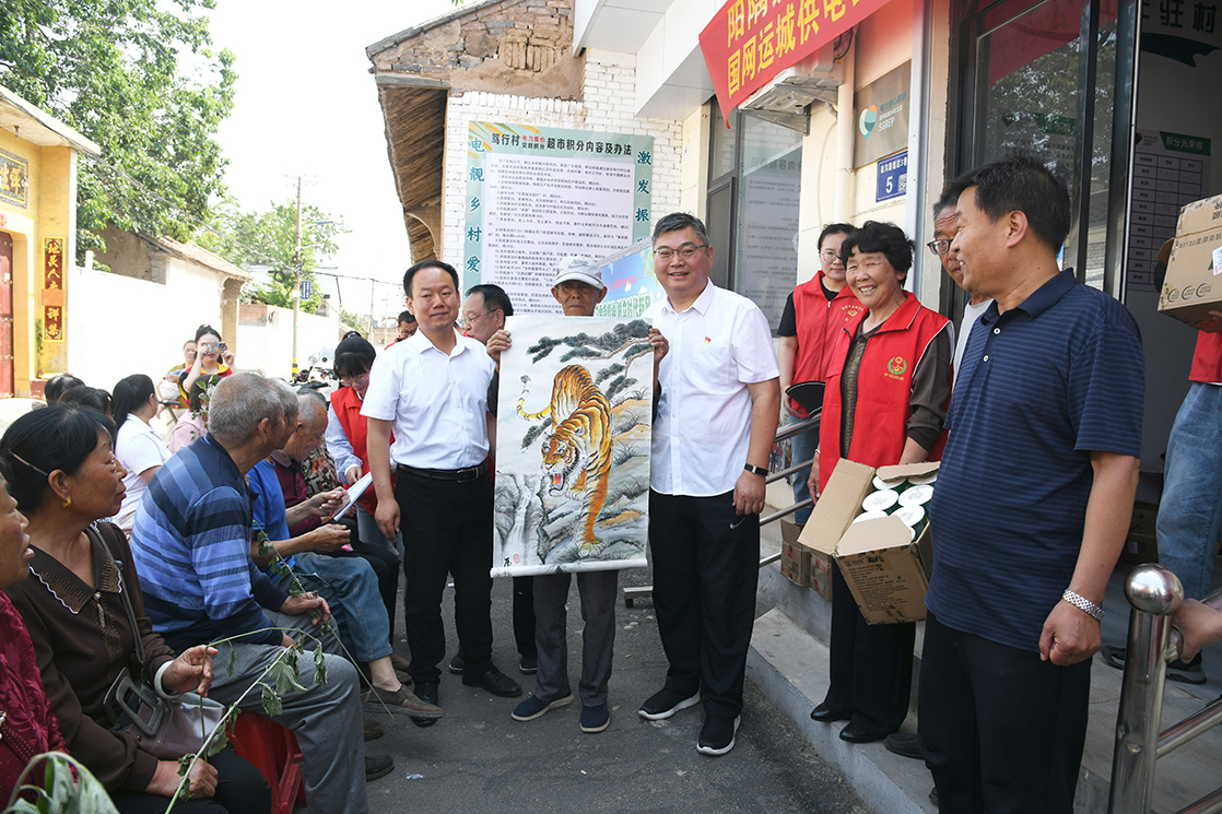 闻喜县阳隅镇笃行村开展 “端午传情心向党 国网笃行践初心” 主题活动